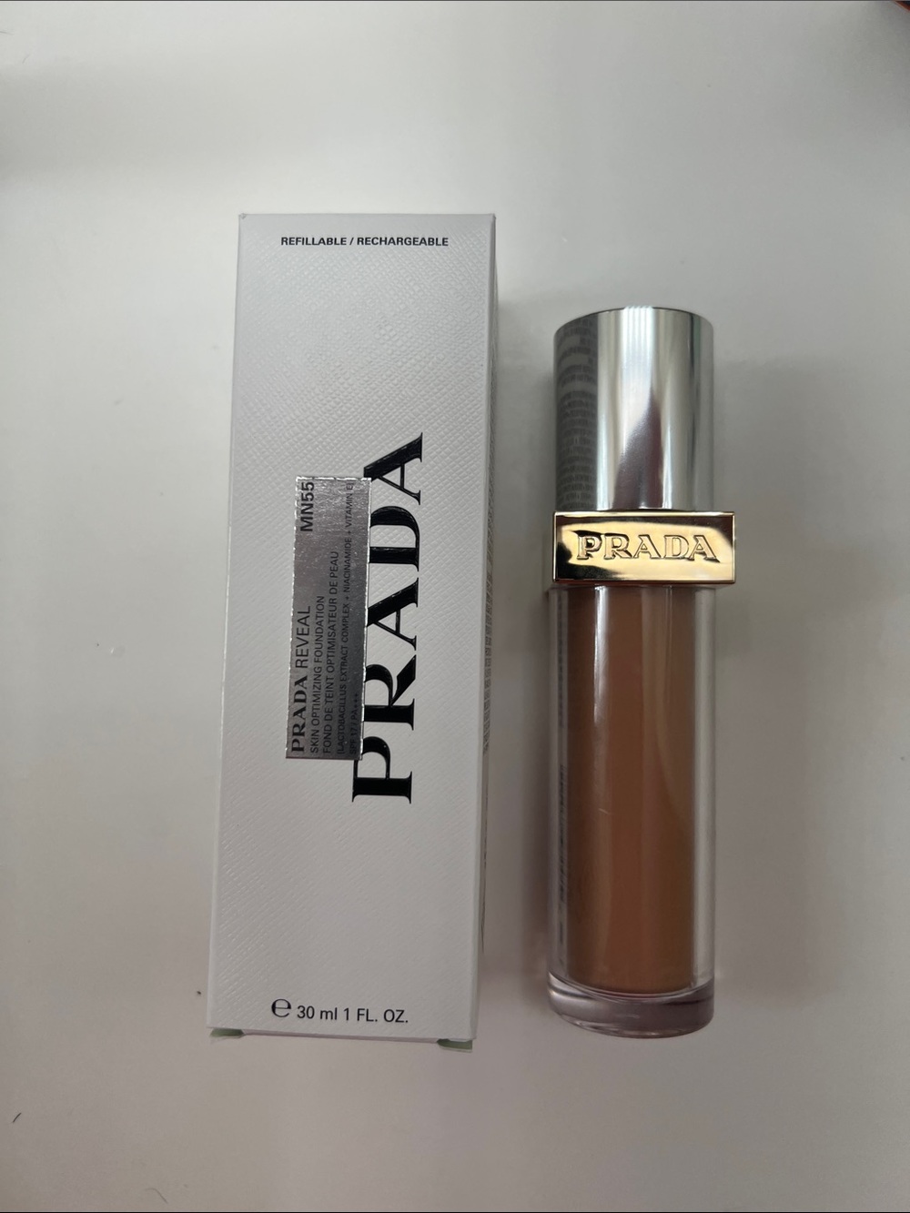 PRADA REVEAL skin optimizing foundation Lactobacillus, niacinamide, Vit E, MN55